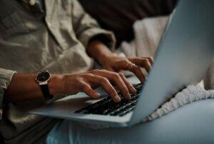 Beginner learning how to make money online from home in 2026 using digital skills and a laptop.
