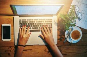 Professional using essential tools for online business growth